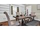 Dining room with wood table and padded chairs at 205 Woodlawn St, Walterboro, SC 29488
