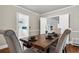 Dining room with wood table and padded chairs at 205 Woodlawn St, Walterboro, SC 29488