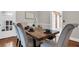 Dining room with wood table and padded chairs at 205 Woodlawn St, Walterboro, SC 29488