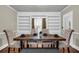 Dining room with wood table and padded chairs at 205 Woodlawn St, Walterboro, SC 29488