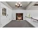 Upstairs area with brick fireplace and unique lighting fixture at 205 Woodlawn St, Walterboro, SC 29488