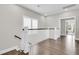 Upstairs hallway with hardwood floors and plenty of natural light at 2072 Amenity Park Dr, Mount Pleasant, SC 29466
