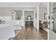 Elegant hallway with hardwood floors and seamless flow into living areas at 2072 Amenity Park Dr, Mount Pleasant, SC 29466