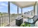 Inviting covered porch with comfortable seating and scenic neighborhood views at 2072 Amenity Park Dr, Mount Pleasant, SC 29466