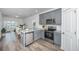 Modern kitchen featuring gray cabinets, stainless steel appliances, and granite countertops at 208 Cache Ct, Charleston, SC 29414