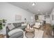 Comfortable living space with a couch and an open layout that seamlessly connects to the kitchen at 208 Cache Ct, Charleston, SC 29414
