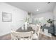 Inviting open-concept living and dining area with modern decor and plenty of natural light at 208 Cache Ct, Charleston, SC 29414