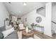 Open-concept living space with a comfortable couch, modern furniture, and easy access to the kitchen at 208 Cache Ct, Charleston, SC 29414