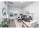 Cozy living room with a gray sofa, stylish coffee table, and large windows for natural light at 208 Cache Ct, Charleston, SC 29414