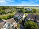 Birds eye view of a multi-Gathering community with lush green landscaping and serene marsh views on a sunny day at 2087 Sterling Marsh Ln, Seabrook Island, SC 29455