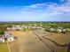 Overhead view shows a marsh side real estate development with a dock, winding creek and stunning views of the coastline at 2087 Sterling Marsh Ln, Seabrook Island, SC 29455