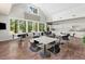 Bright dining area features large windows and clean, modern design at 2087 Sterling Marsh Ln, Seabrook Island, SC 29455