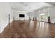 Spacious event space with gleaming hardwood floors and elegant lighting at 2087 Sterling Marsh Ln, Seabrook Island, SC 29455