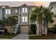 Inviting two-story townhome with well-manicured landscaping and garage at 2087 Sterling Marsh Ln, Seabrook Island, SC 29455