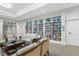 Cozy library featuring bookshelves and comfortable seating at 2087 Sterling Marsh Ln, Seabrook Island, SC 29455