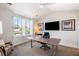 Bright office space with neutral walls, large window with white shutters, and light colored carpet at 2087 Sterling Marsh Ln, Seabrook Island, SC 29455