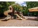 Neighborhood playground with slides, swings, and a sunshade at 2087 Sterling Marsh Ln, Seabrook Island, SC 29455