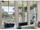 Picturesque view from the porch featuring scenic marsh views through large windows at 2087 Sterling Marsh Ln, Seabrook Island, SC 29455