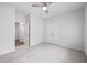 A bright bedroom with a ceiling fan and closet at 209 Country Gate Ln, Summerville, SC 29485
