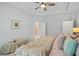 Tastefully decorated bedroom featuring tray ceiling, ceiling fan and connecting bath at 209 Country Gate Ln, Summerville, SC 29485