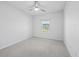Neutral bedroom showcasing window for natural light and a ceiling fan at 209 Country Gate Ln, Summerville, SC 29485