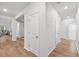 Hallway with light-colored wood floors with a doorway to another living space at 209 Country Gate Ln, Summerville, SC 29485