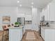 Well-equipped kitchen with granite countertops, stainless steel appliances, and tile backsplash at 209 Country Gate Ln, Summerville, SC 29485