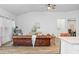 Bright living room with hardwood floors, recessed lighting, and a cozy leather sofa at 209 Country Gate Ln, Summerville, SC 29485