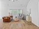Living room with modern seating and ample sunlight from windows at 209 Country Gate Ln, Summerville, SC 29485