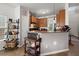 Cozy kitchen featuring wooden cabinets, counter space and tiled floor at 216 Goldfinch Ln, Summerville, SC 29485