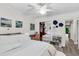 Well-lit bedroom featuring closet space and ceiling fan, offering a comfortable and functional space at 2317 Tall Sail Dr # 1005, Charleston, SC 29414