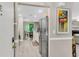 Modern kitchen with stainless steel appliances and an adjacent dining area at 2317 Tall Sail Dr # 1005, Charleston, SC 29414