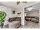 Inviting living room showcases comfortable seating and seamless transition to the cozy Gathering room at 2317 Tall Sail Dr # 1005, Charleston, SC 29414