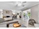 Open-concept living area flowing into a kitchen and sunroom, creating a spacious feel at 2317 Tall Sail Dr # 1005, Charleston, SC 29414