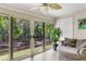 Bright sun room featuring large windows with scenic views and a comfortable seating area at 2317 Tall Sail Dr # 1005, Charleston, SC 29414