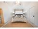 Bright bedroom with a large bed, neutral decor, and lots of natural light for a calming atmosphere at 2515 Violet Ave, North Charleston, SC 29405