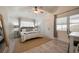 Bright bedroom featuring a desk, ceiling fan, and a window with natural lighting at 2515 Violet Ave, North Charleston, SC 29405
