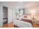 Bright bedroom with hardwood floors, natural light, closet, and well-appointed furniture at 2515 Violet Ave, North Charleston, SC 29405
