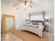 This cozy bedroom has a ceiling fan, a big mirror, and decor at 2515 Violet Ave, North Charleston, SC 29405