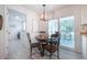Cozy dining room with elegant table, chair and views of the outdoors at 2515 Violet Ave, North Charleston, SC 29405