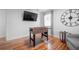 Entertainment room featuring a foosball table, hardwood floors, and a wall-mounted TV at 2515 Violet Ave, North Charleston, SC 29405