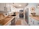Modern kitchen featuring stainless steel appliances, light countertops, and cabinets for a sleek look at 2515 Violet Ave, North Charleston, SC 29405