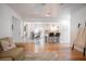 Open-concept living area with hardwood floors, seamlessly connecting the living and kitchen spaces at 2515 Violet Ave, North Charleston, SC 29405