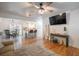 Open-concept living room with hardwood floors and lots of natural light at 2515 Violet Ave, North Charleston, SC 29405