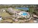 Aerial view showcasing community pool, amenities, and lush landscaping for resort-style living at 2655 Gnarled Pine, Seabrook Island, SC 29455