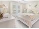 Bedroom with a ceiling fan, window with shutters, and coastal decor at 2655 Gnarled Pine, Seabrook Island, SC 29455