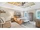 Serene bedroom with coffered ceilings, neutral color palette, and comfortable furnishings at 2655 Gnarled Pine, Seabrook Island, SC 29455