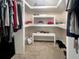 Walk-in closet featuring built-in shelving, shoe racks, and ample storage space for clothes at 2655 Gnarled Pine, Seabrook Island, SC 29455