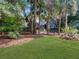 Charming home nestled among mature trees and lush landscaping offers a peaceful setting at 2655 Gnarled Pine, Seabrook Island, SC 29455