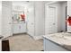Bathroom with dual sinks, granite countertops, and tile floors at 283 Saxony Loop, Summerville, SC 29486